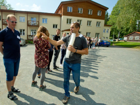 The participants of the conference are preparing for the outdoor activity.