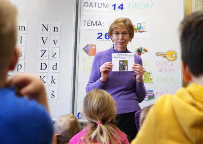 Healthy Youth Worker Petra Stranska talks to the first-graders about various dangers.